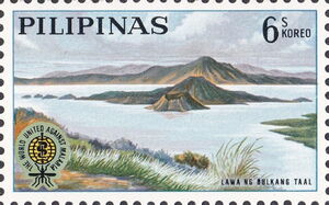 Volcano in Lake Taal and Malaria Eradication Emblem