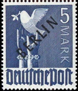 Peace dove over unfettered hands