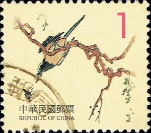 Bird Feeding on Branch