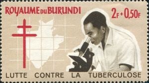 Scientist with Microscope and Map of Burundi