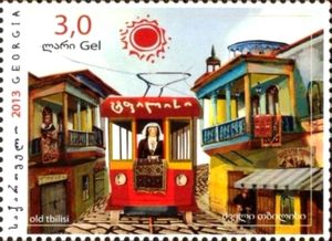 Woman Riding in Tram