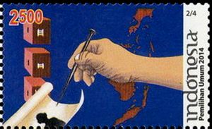 Voting boxes, hand and map