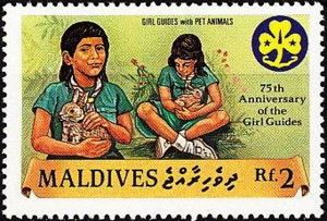 Stamp: Guides, rabbits (Maldives(Girl Guides, 75th Anniv. (in 1985)) Mi ...