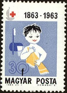 Child with towel and toothbrush