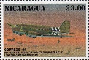 C-47 transports dropping paratroopers.