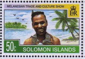 Man smiling in front of water