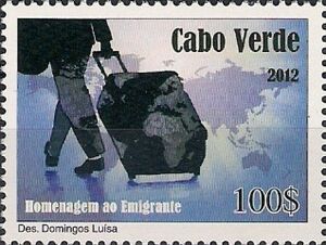 Man wheeling suitcase