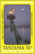 Torch held aloft, full moon