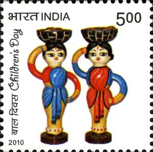 Two Dolls with Baskets on their Heads