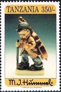 Boy with cello on back