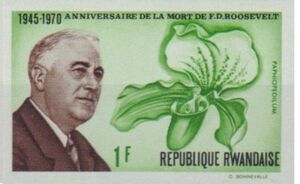 Stamp: F. D. Roosevelt and Paphiopedilum (Rwanda(25th Anniversary of ...
