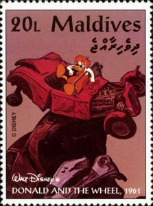 Donald Duck the Caveman in a crashed Car