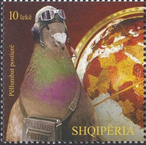 Globe and Pigeon (Columba livia domestica) with Mail Bag