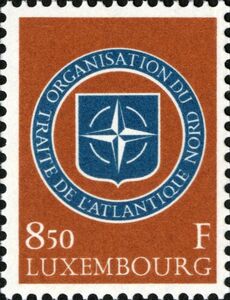 Emblem of N.A.T.O. (Background Red Brown)