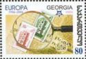 Magnifying Glass and First Europa Stamps