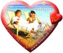 Couple on a Deck Chair on the Beach