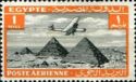 Aircraft flying over the Pyramids of Giza
