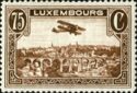 Biplane over Luxembourg City (75c brown)