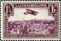 Biplane over Luxembourg City (1¼ Fr. purple)