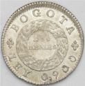 2 Reales (Date up arms)