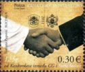 Handshake, National and Papal Coat of Arms