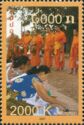 Women Kneel Before Buddhist Monks
