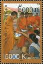 Women Give Food to the Monks