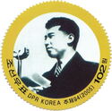 Kim Il Sung at the microphone
