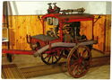 Fire steam pump on a horse-drawn carriage, 1880-1929