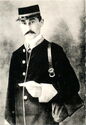 Early postie in uniform, circa 1910