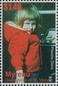 Diana as child in red hooded jacket