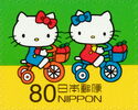 Hello Kitty and Mimmy on Tricycles