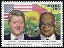 Clinton and Jagan with Guyana and USA Flags