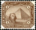 Sphinx in front of Cheops pyramid