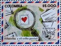 Stamp with Heart under Magnifying Glass