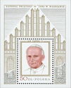 Pope John Paul II in a golden frame