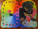 Puppy with flowers_75-377