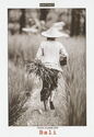 Farmer In Paddy Field