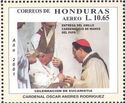 Receiving Cardinal ring from Pope John Paul II