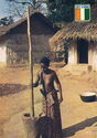 Woman grinding in the village