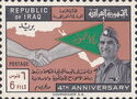 Handshake, flag, General Kassem