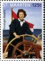 Queen Beatrix at ship's wheel