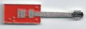 1 Dollar (Red rectangular guitar - Bo Diddley.)