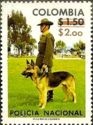 Policeman with German Shepherd (Canis lupus familiaris)