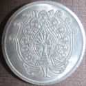 Peacock amusement token