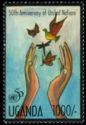 UN50 - Hands Releasing Butterflies, Dragonfly and Dove