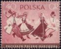 Two Couples Dancing in Polish and Russian Folk Costumes
