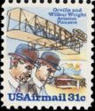 "Wright Flyer I" and Wright Brothers (in bowler hats)