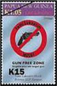 Gun free zone emblem ('Krismas SEIF Kempan') - surcharged