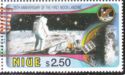 Astronaut standing by lunar experiment package